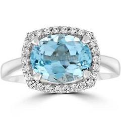 2ct Oval Blue Topaz and Natural Diamond Halo Ring 10K White Gold