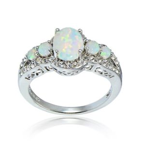 Simulated White Opal and Cubic Zirconia Oval Halo Five Stone Ring